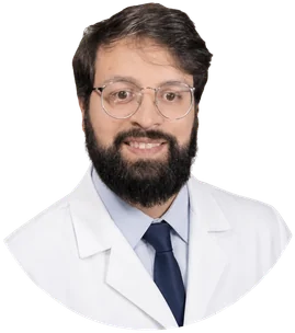Foto do Dr. Matheus Gallo, de jaleco branco